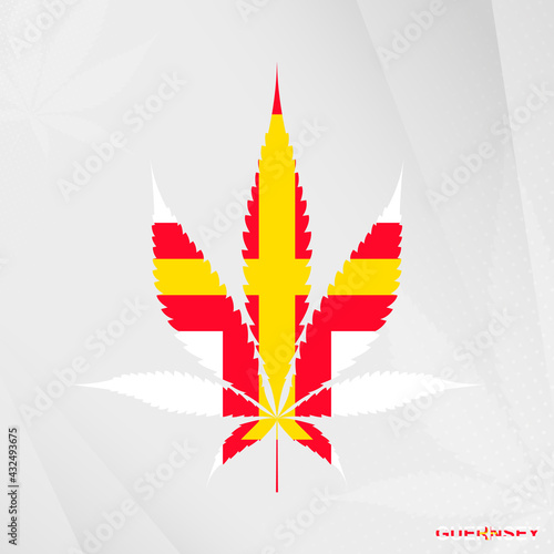 Flag of Guernsey in Marijuana leaf shape. The concept of legalization Cannabis in Guernsey.