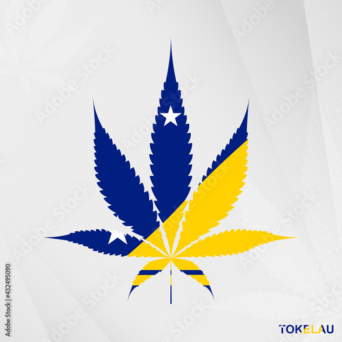 Flag of Tokelau in Marijuana leaf shape. The concept of legalization Cannabis in Tokelau.