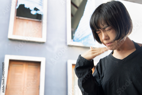 asian woman covering her nose for bad smell, concept of stink construction paint, bad breath, unpleasant smell, rotten food, odor, body bad smell, air pollution, polluted air