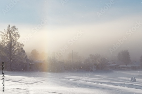The side sun and diamond dust phenomenon on a winter day in Östersund © Krzysztof Stasiak