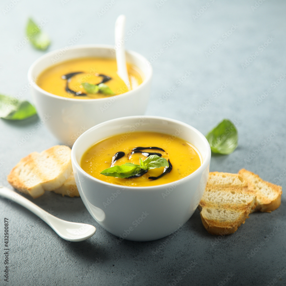 Traditional homemade pumpkin or carrot soup Traditional homemade pumpkin or carrot soup