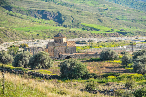 The monastery arose in the 13th century at the confluence of the Sinti River into the Xeros Potamos River. It is a wonderful monument of Cypriot-Venetian architectural style.       photo