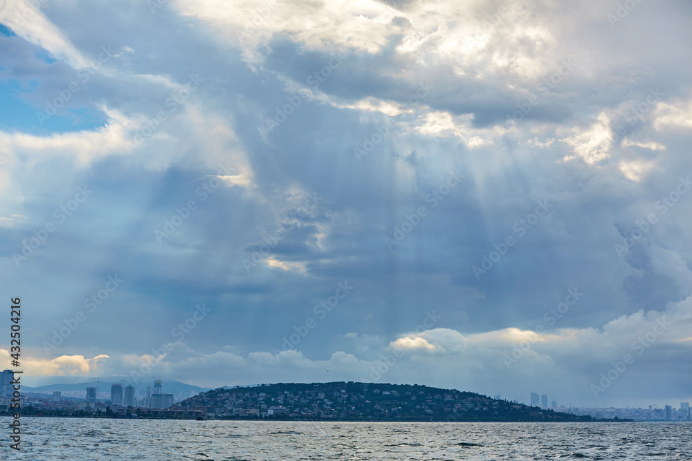 Evening boat trip along the Bosphorus. Panorama of Istanbul view from the ferry Evening boat trip along the Bosphorus. Panorama of Istanbul view from the ferry