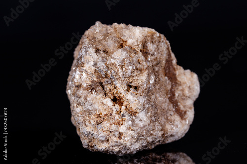 Macro mineral stone Albit on black background