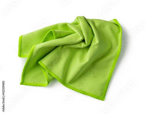 Crumpled green microfiber cloth isolated on white background. Soft microfiber napkin for cleaning objects and surfaces. Housework, cleaning and purity equipment.