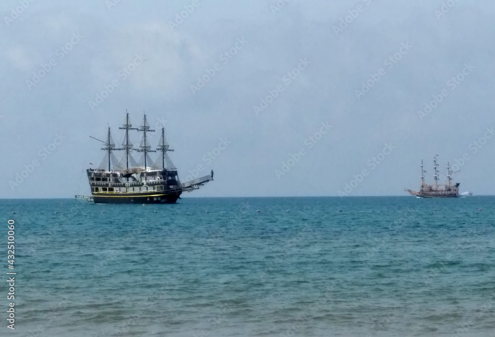 ship at sea against blue sky ship at sea against blue sky