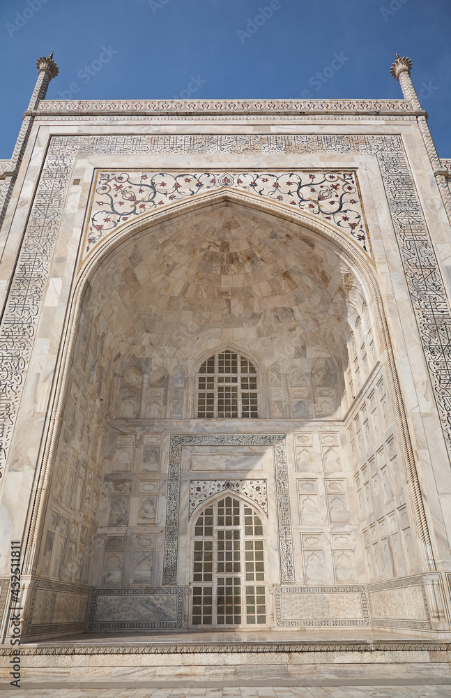 An entrance of the Taj Mahal in Agra, India. The Muslim Great Mogul Shah Jahan had the building built in memory of his great love Mumtaz Mahal (Arjumand Bano Begum, later also Mumtaz-uz-Zamani), who d