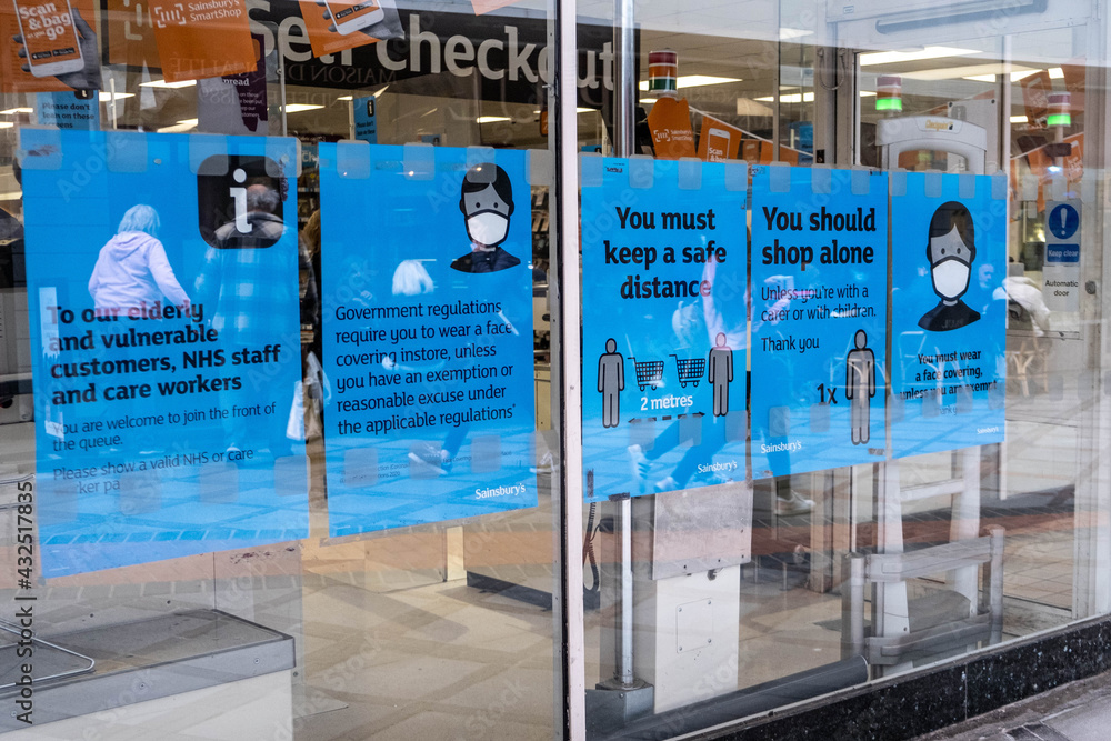 Sainsburys Supermarket With Shoppers Covid19 Safety Warning Signs