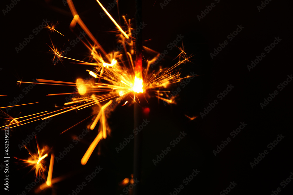 Close up of burning handheld firework