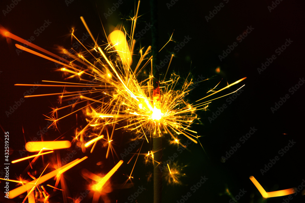 Close up of burning handheld firework Close up of burning handheld firework