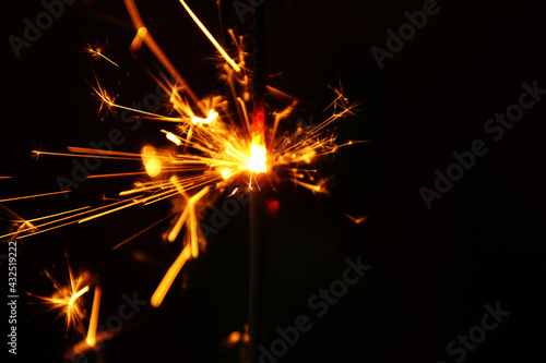 Close up of burning handheld firework