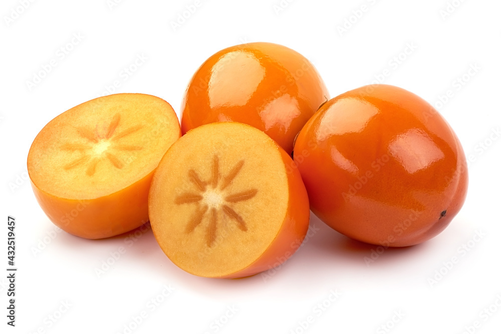 Fresh Ripe Rersimmons with juicy half, close-up, isolated on white background. Fresh Ripe Rersimmons with juicy half, close-up, isolated on white background.
