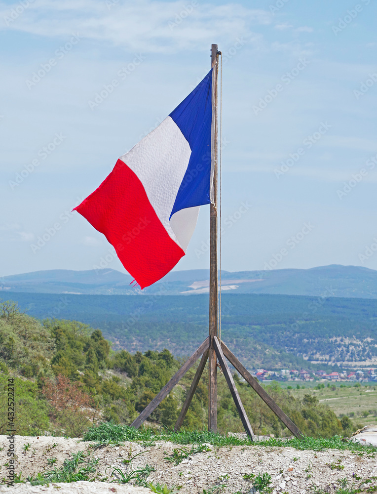 Fototapeta premium Flag of France against the blue sky