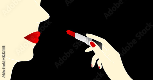 Side view of beautiful woman face with red lip and her hand holding red lipstick for apply to mouth isolated on black background with free copy space