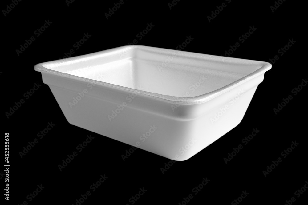 Disposable plastic lunch box isolated on black background. Plastic container isolated. Single-use plastic packaging Disposable plastic lunch box isolated on black background. Plastic container isolated. Single-use plastic packaging