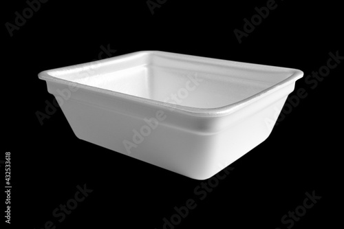 Disposable plastic lunch box isolated on black background. Plastic container isolated. Single-use plastic packaging