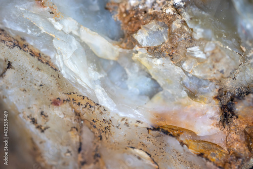 unworked, natural quartz stone. close up. background. Wall paper. photo