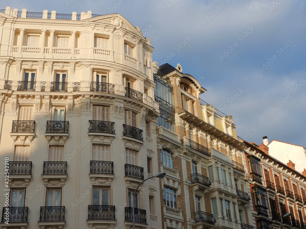 Classy residential buildings in Retiro district of Madrid, Spain. Set of rich classical houses on the street close to central park
