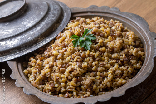 Traditional delicious Turkish foods; bulgur pilaf with green lentils (Turkish name; yesil mercimekli bulgur pilavi) photo