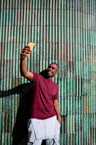 young african american using mobile phone