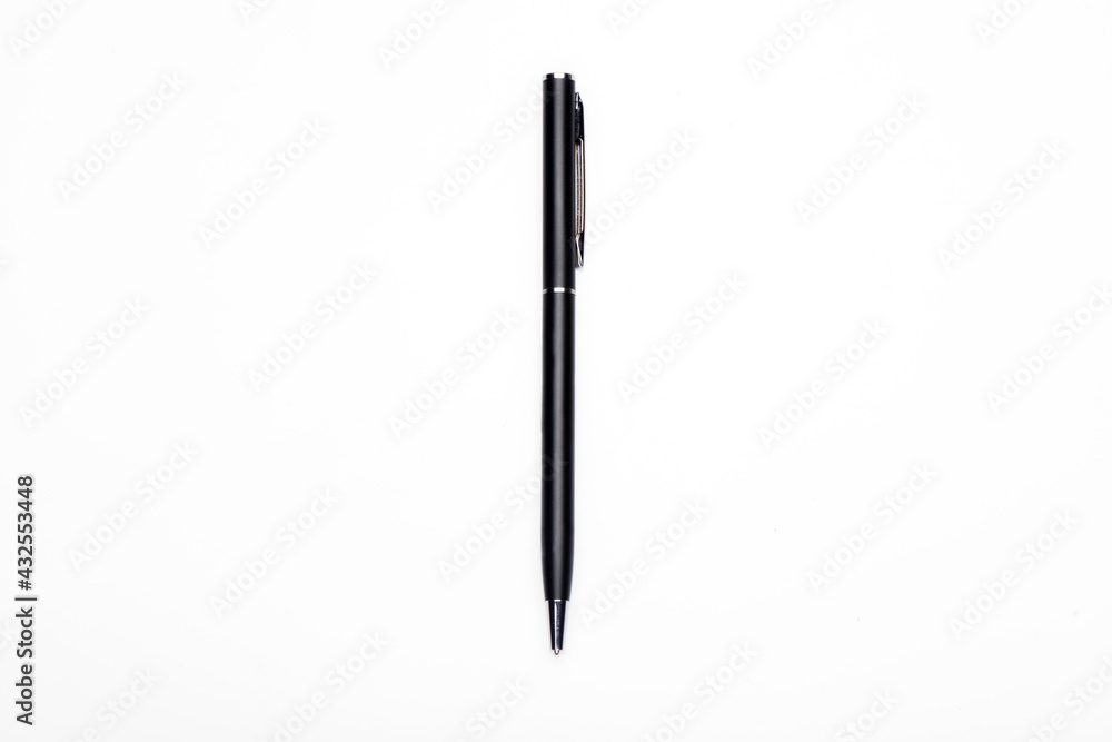 Ballpoint pen on a white background, black metal pen. Ballpoint pen on a white background, black metal pen.