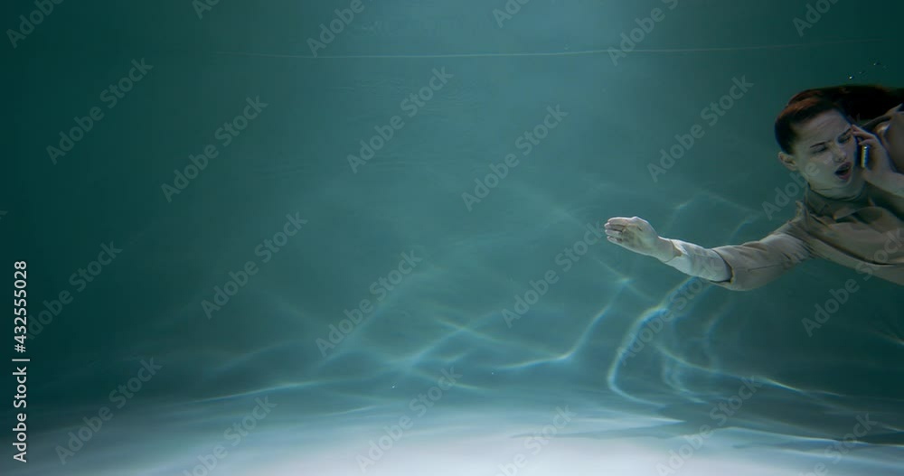 Epic cinematic shot of young happy business woman talking on the phone