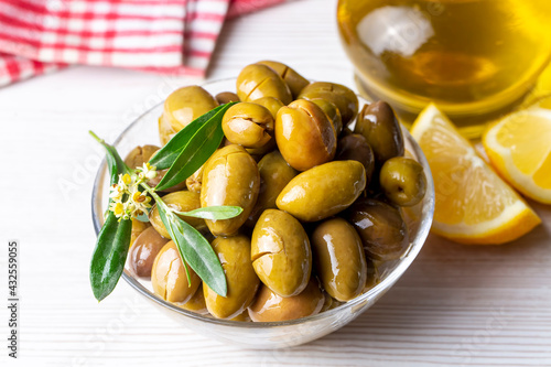 Cracked green olives. Crack...