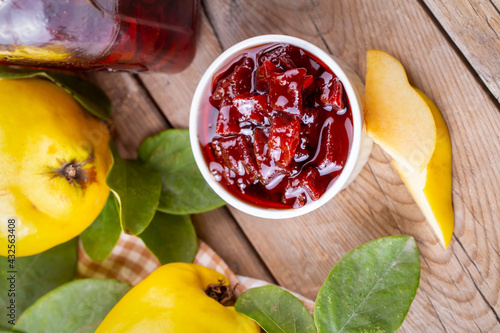 Homemade quince jam in a gl...