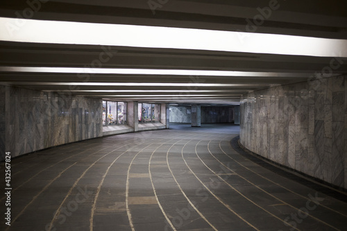 Fotografie Empty modern pedestrian underpass with neon light