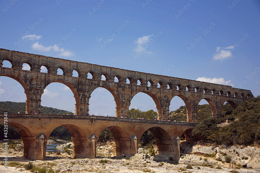 Pont du Gard, Gard, Occitanie, France: Roman aqueduct over Gardon river: general view from downstream