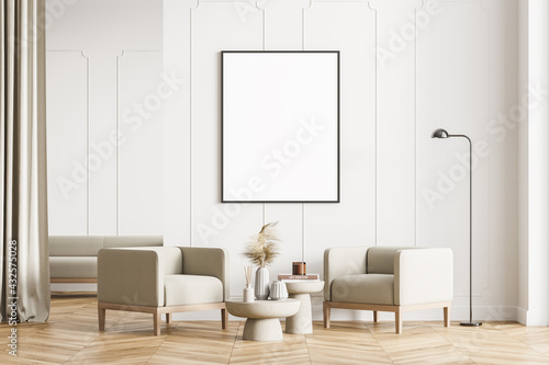 Modern living room interior with wooden floor, furniture, table and armchairs. Home architecture concept. A poster canvas on white wall. Mock up. No people.