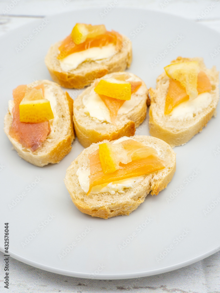 close up photo of assorted fish fillet starters with lemon on top close up photo of assorted fish fillet starters with lemon on top