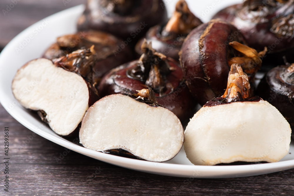 Fototapeta premium water chestnut with clipping path on table