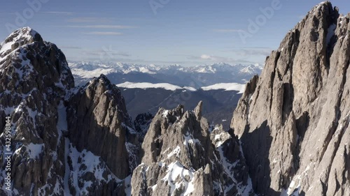Wallpaper Mural Aerial flight adove stunning Alps Cliffs. 
High mountain peaks sharp cliffs Dolomites, Italy
Drone view  from Italy Top Peaks 

 Torontodigital.ca