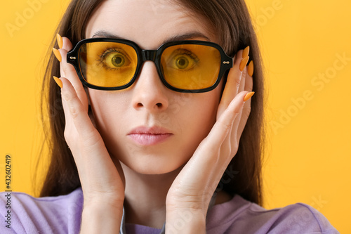 Surprised young woman with ...