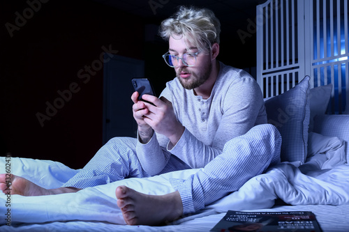 Young man wearing glasses w...