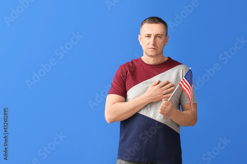 Man with USA flag on color ...