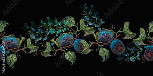 Embroidery blossoming plum and blue flowers on black background. Template for fashionable clothes, t-shirt. Horizontal seamless pattern. Botanical garden art