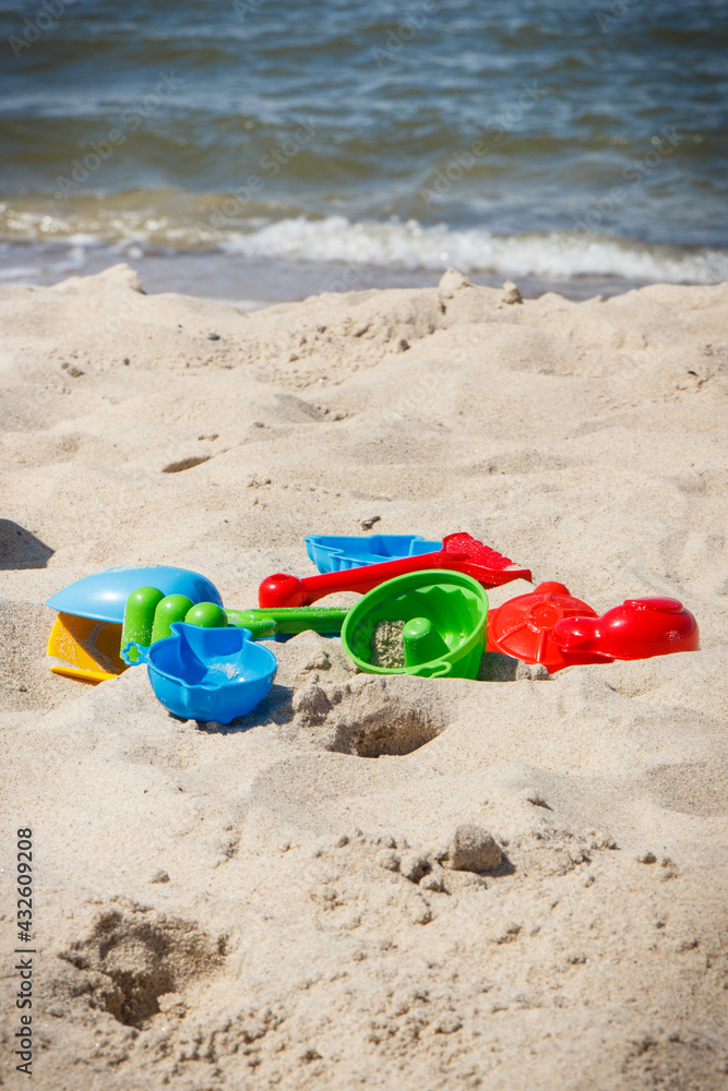 Children toys for relax or playing on sand at beach. Vacation time Children toys for relax or playing on sand at beach. Vacation time