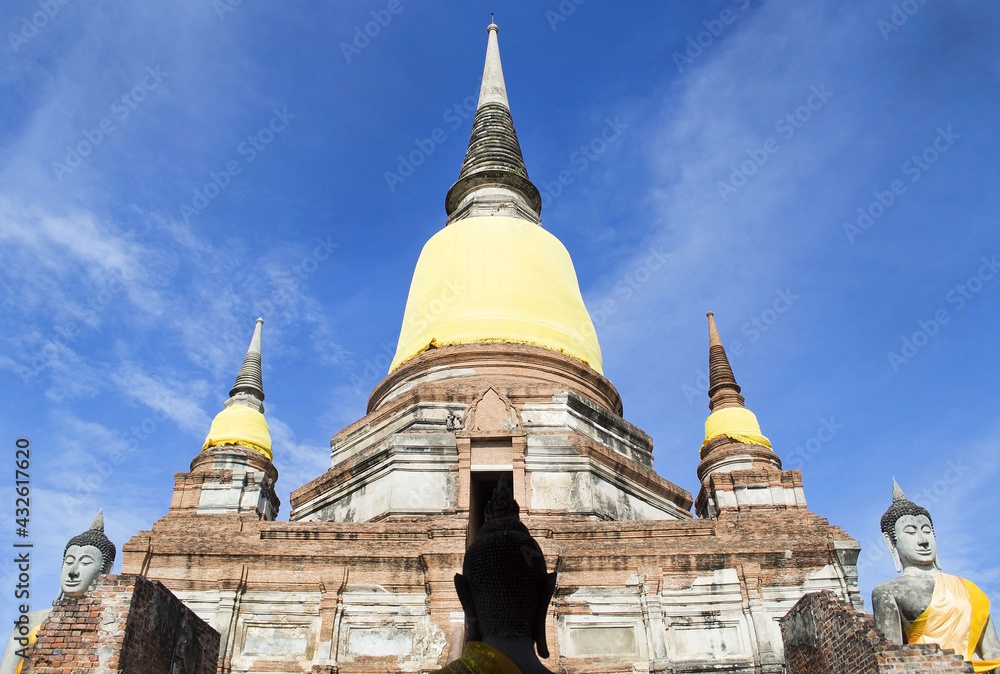 Fototapeta premium Beautiful view of the ancient pagoda of Watyaichaimongkhon in Ayutthaya Province, Thailand. Beautiful temple landscape of Ayutthaya Historical park, public domain
