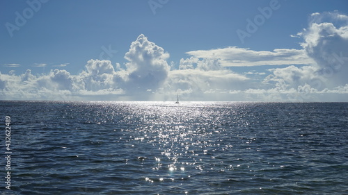 A yacht sailing in the middle of the sea