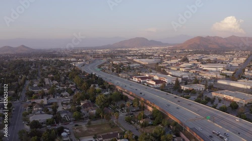 Aerial sunset view of the residential and industrial areas of Riverside, California.