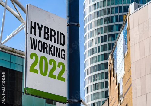 Hybrid Working 2022 sign in a downtown city center