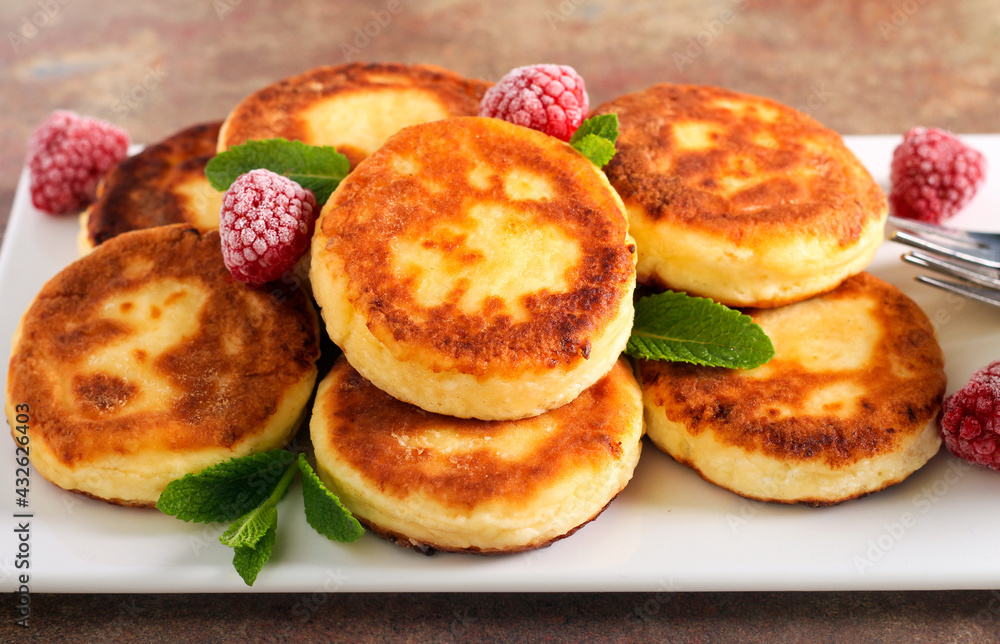 Soft cheese sweet fritters called syrniki