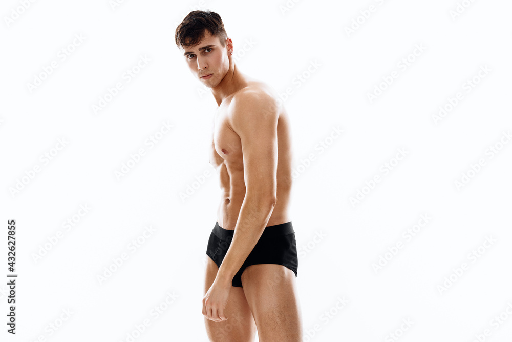 portrait of a sexy man in panties on a light background cropped view close-up portrait of a sexy man in panties on a light background cropped view close-up
