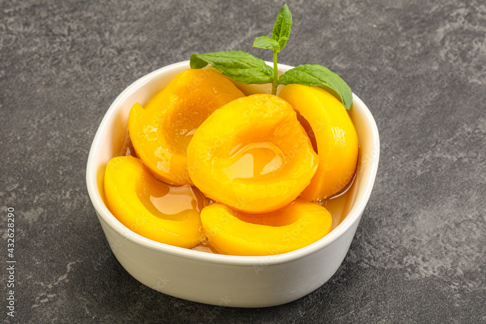 Sweet ripe canned peaches with mint Sweet ripe canned peaches with mint