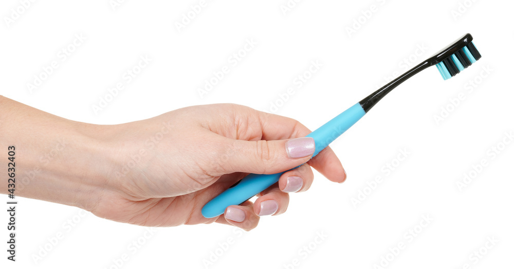 Hand with blue dental toothbrush isolated on white background Hand with blue dental toothbrush isolated on white background