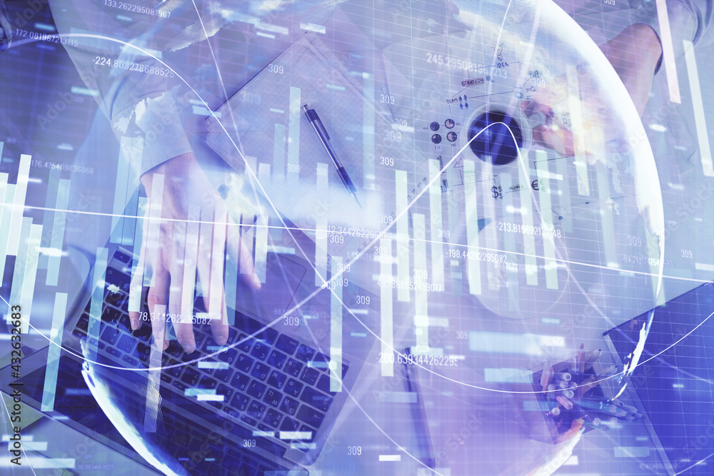 Double exposure of man's hands typing over computer keyboard and business theme hologram drawing. Top view. Financial markets concept. Double exposure of man's hands typing over computer keyboard and business theme hologram drawing. Top view. Financial markets concept.