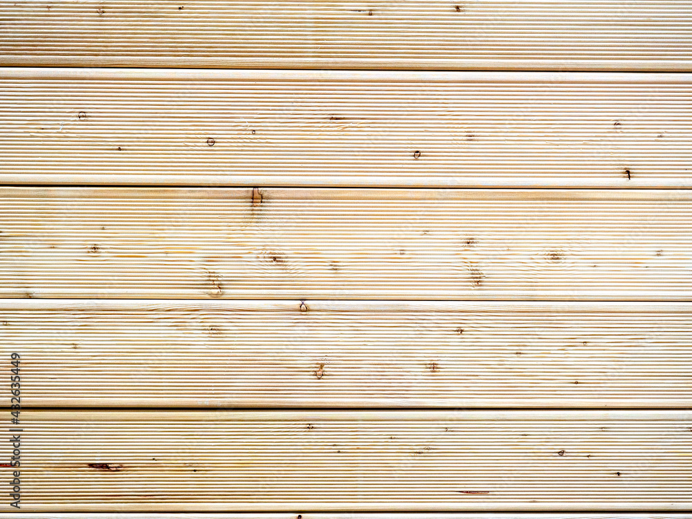 Decking made of larch. Wood texture, background. Treated wood Decking made of larch. Wood texture, background. Treated wood