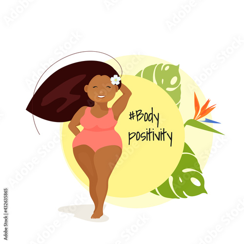 Attractive overweight latino american woman, full model in swimsuit, positive body concept, standing on yellow background with tropical leaves and flowers. Summer hello. Love your body. love myself.